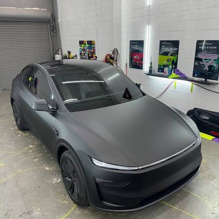 Tesla Model Y wrapped in satin dark grey